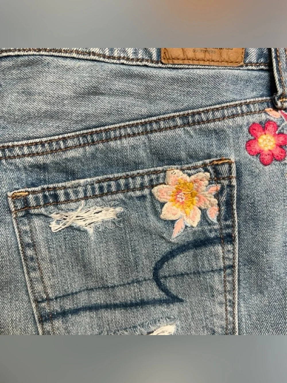 American Eagle Outfitters Light Blue Denim Mini Skirt with Floral Embroidery